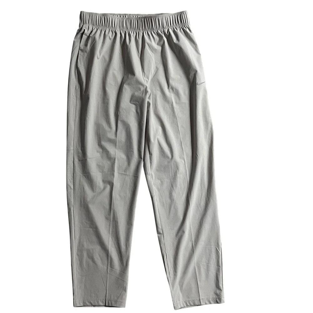 Nike Dri-FIT Womens Tapered Training Pants Light Gray Mesh Vented Joggers Size M